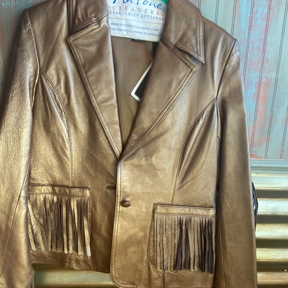 Metallic fringe leather jacket